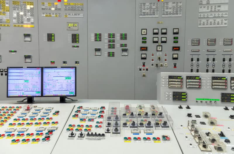 Complicated Soviet-era nuclear power plan control panel as metaphor for journey orchestration dashboard